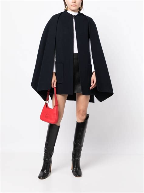 cape black dior|Dior raincoat.